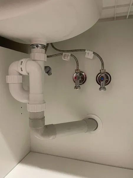 Under-sink plumbing installation by Jim Monger Plumbing